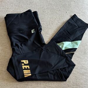 P.E Nation Black and Gold Leggings